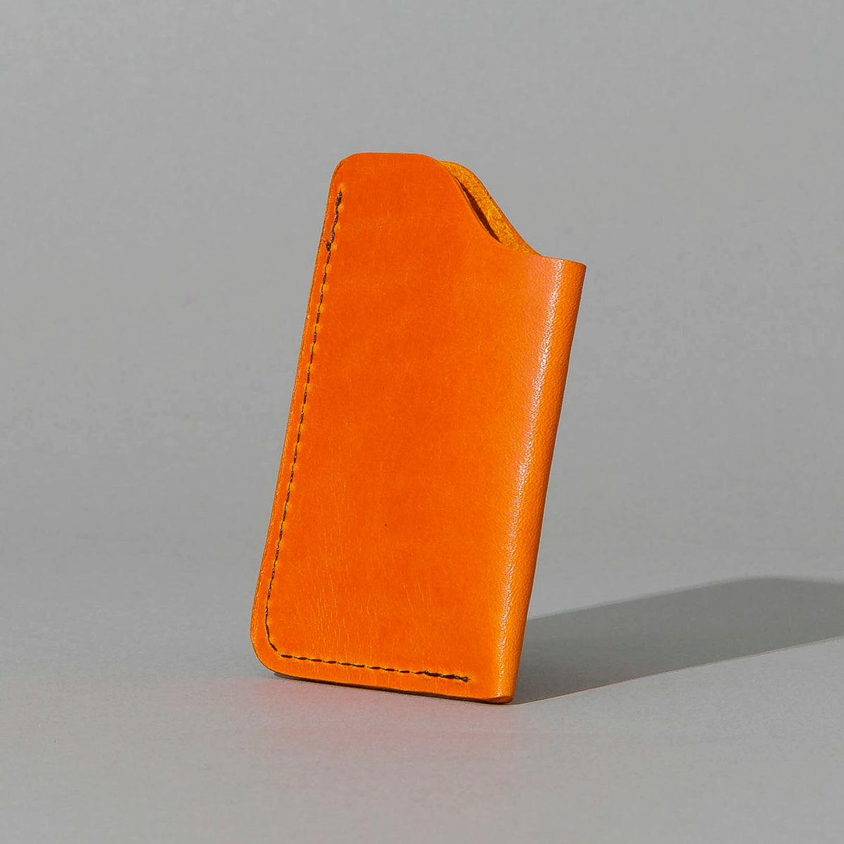 One-Shot Card Case in Orange Latigo, front view, shot 1