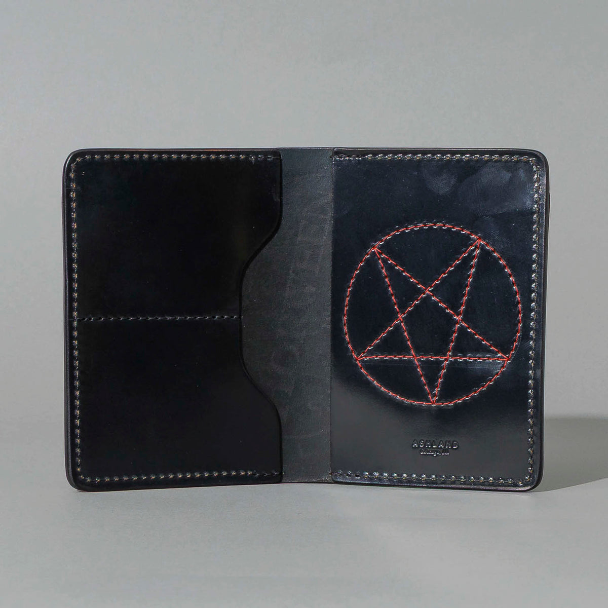One-Off Traveler Passport Holder in Black Shell Cordovan with Red Pentagram Embroidery, open, showing interior, shot 2