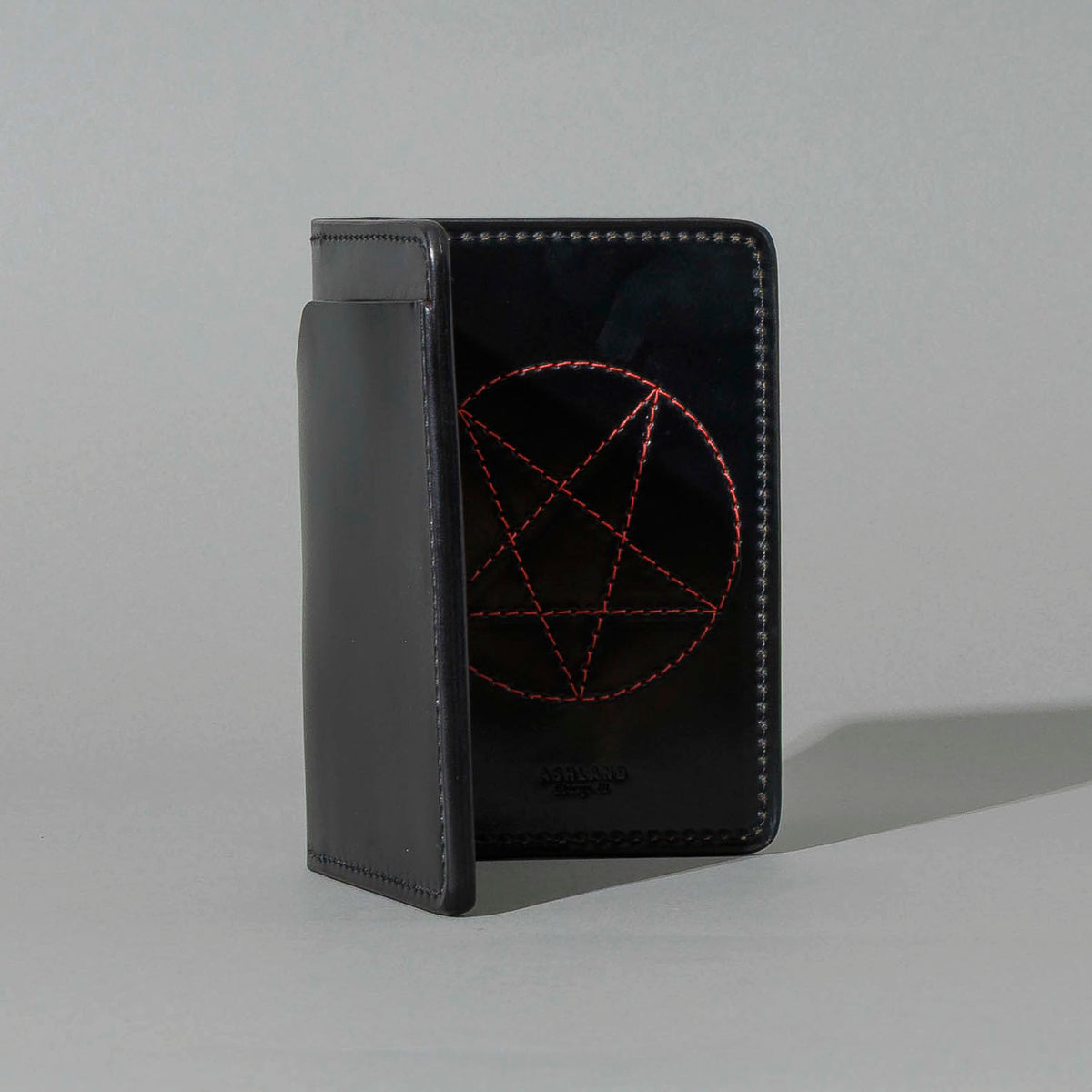 One-Off Traveler Passport Holder in Black Shell Cordovan with Red Pentagram Embroidery, front view, shot 2