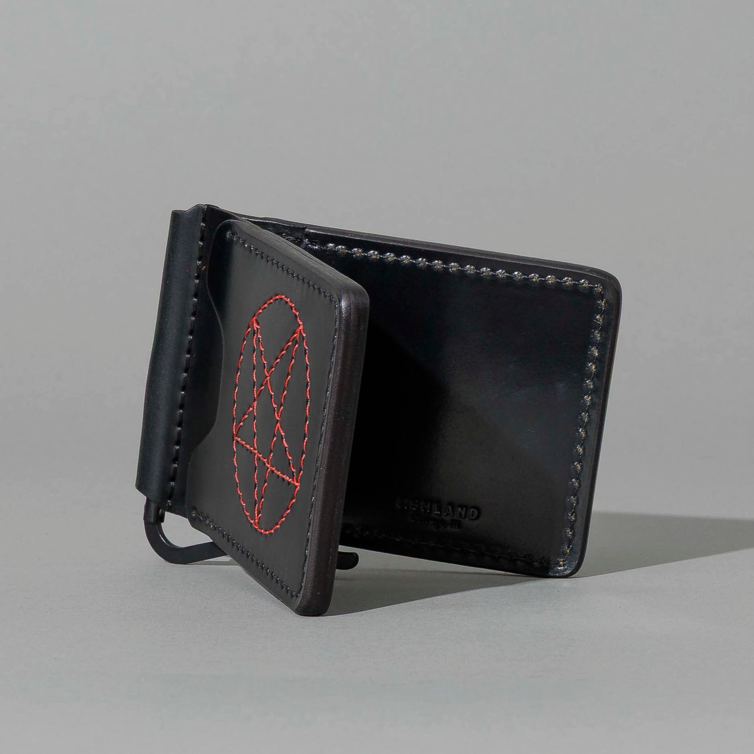 One-Off Capone Money Clip in Black Shell Cordovan with Red Pentagram Embroidery, side profile view