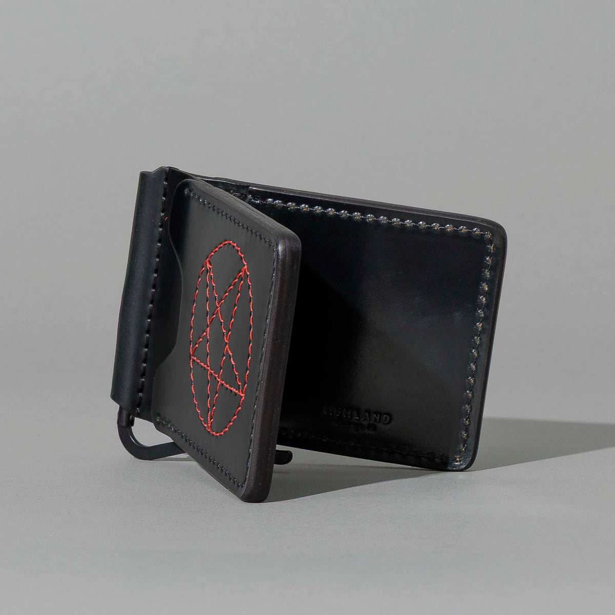 One-Off Capone Money Clip in Black Shell Cordovan with Red Pentagram Embroidery, side profile view