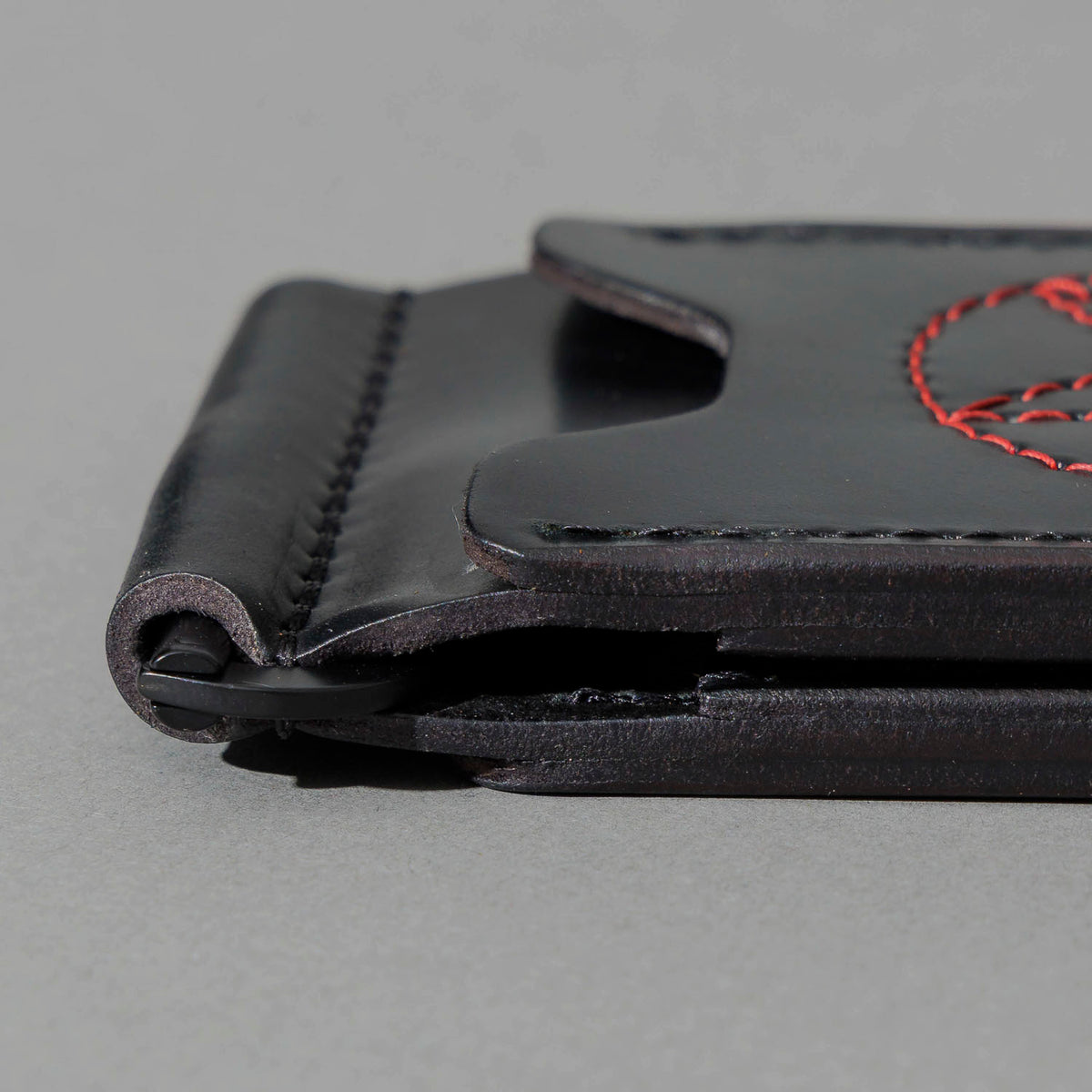 One-Off Capone Money Clip in Black Shell Cordovan with Red Pentagram Embroidery, close-up detail, shot 2