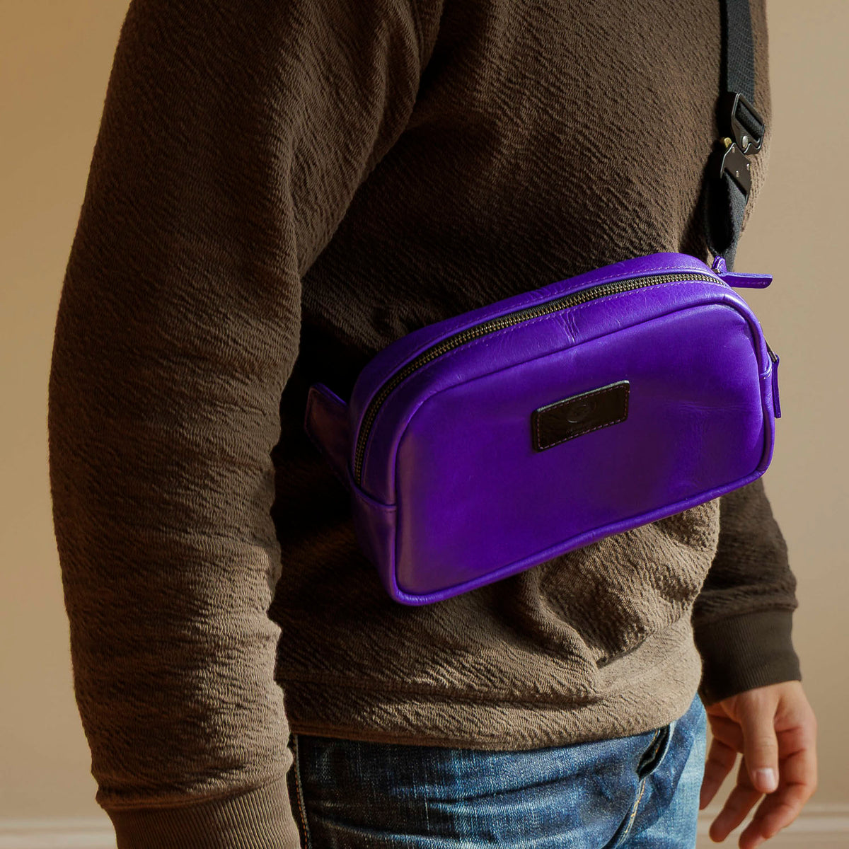 One-Off Sling Bag in Violet Latigo, worn crossbody by a model, shot 2