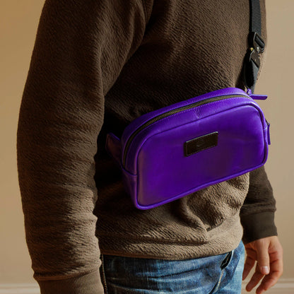 One-Off Sling Bag in Violet Latigo, worn crossbody by a model, shot 2