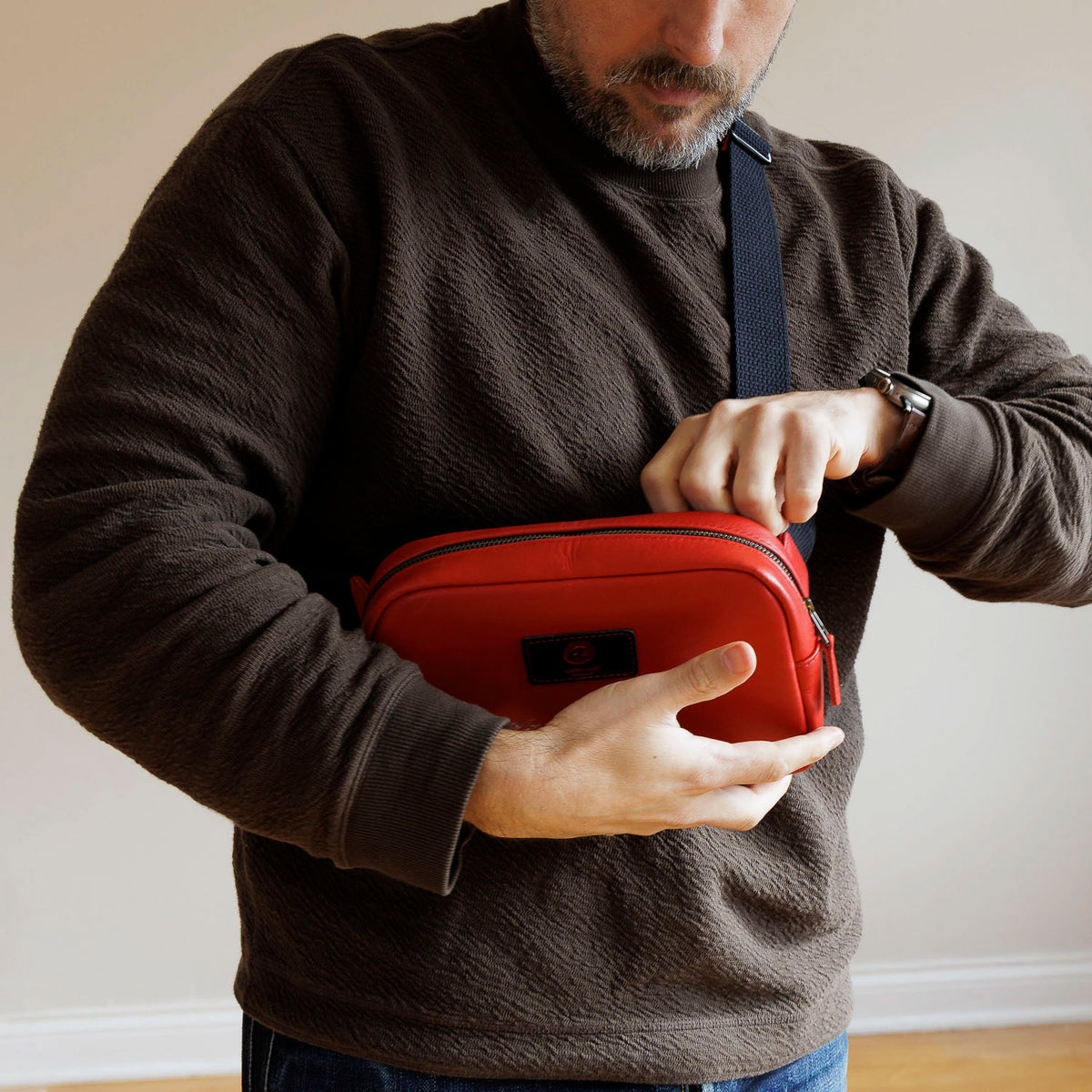 One-Off Sling Bag in Red Latigo, worn crossbody by a model, shot 3