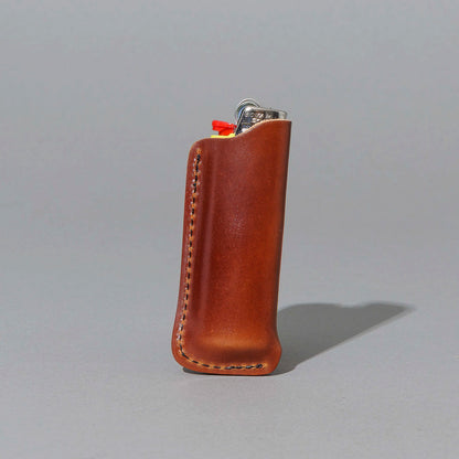 One-Off Lighter in Blood Orange Shell Cordovan, standing upright, side angle, shot 2