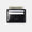 Black leather wallet with money and cards on a light gray background