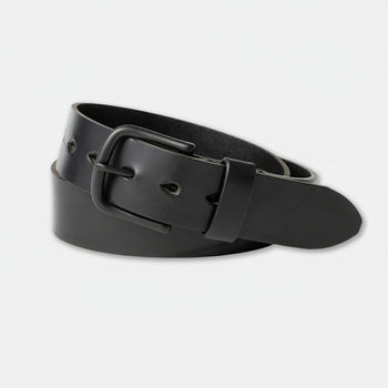 Black leather belt with a black buckle on a light background