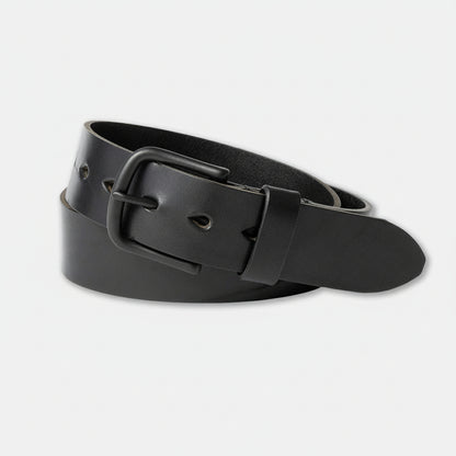 Black leather belt with a black buckle on a light background