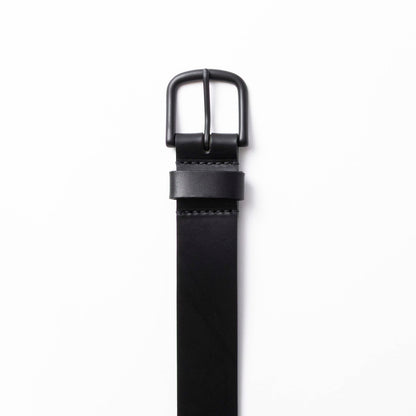 Black leather belt with black buckle on a white background