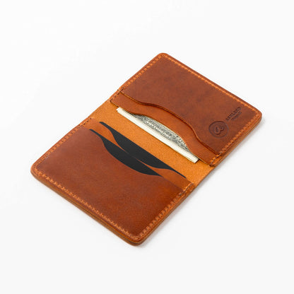 Brown leather wallet with a card holder on a white background