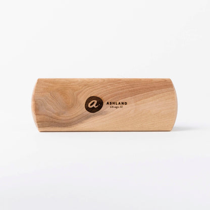 Wooden horsehair brush with a logo on a white background