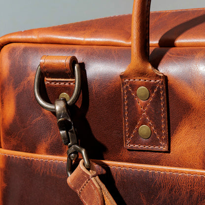 Close-up of the hook and D-ring hardware on the Ashland Leather LaSalle Briefcase
