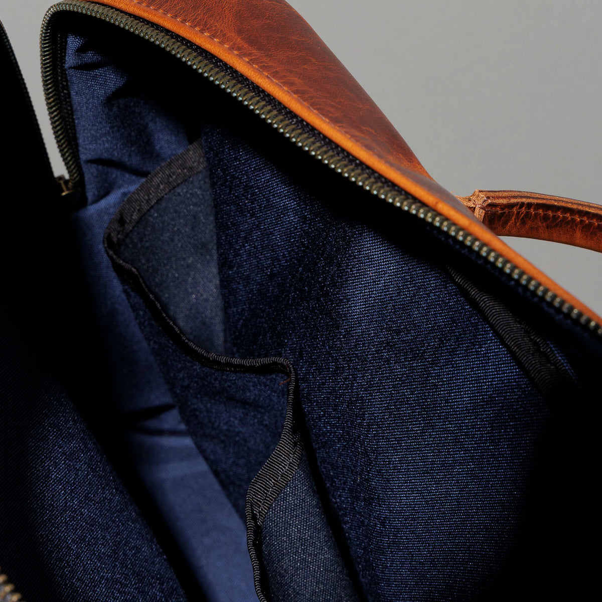 Close-up of the navy Cordura interior lining and pocket inside the Ashland Leather LaSalle Briefcase