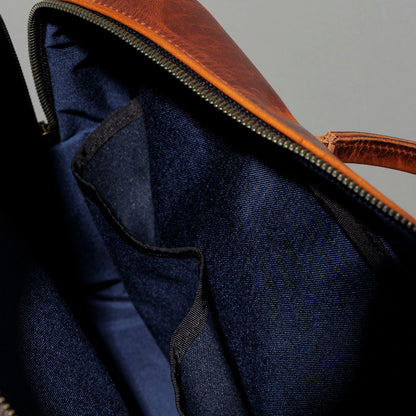Close-up of the navy Cordura interior lining and pocket inside the Ashland Leather LaSalle Briefcase