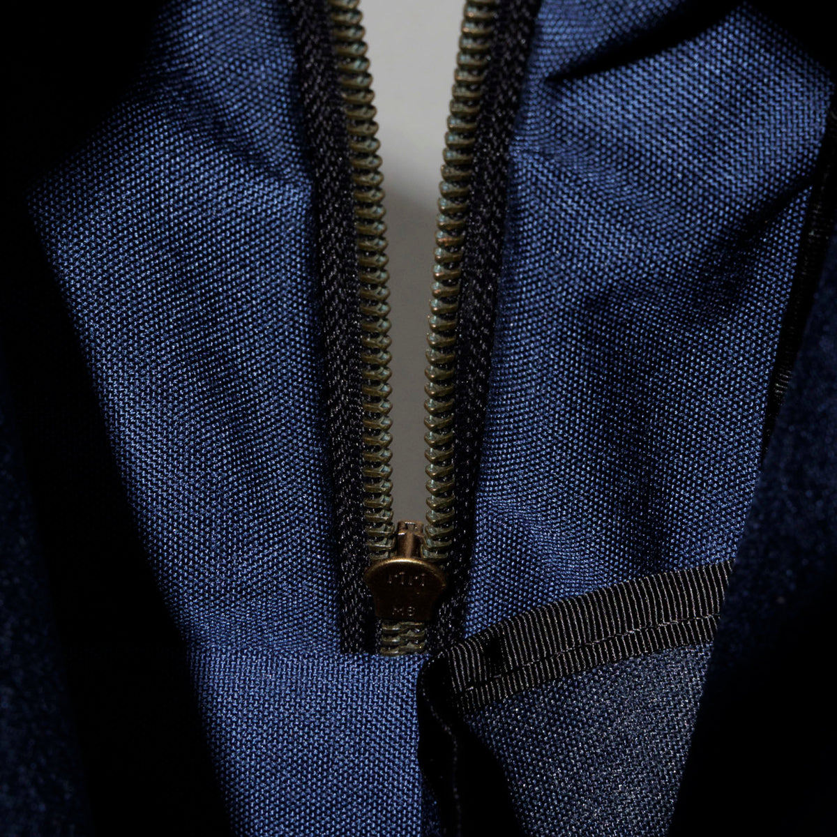 Close-up of the navy Cordura interior lining and zipper inside the Ashland Leather LaSalle Briefcase
