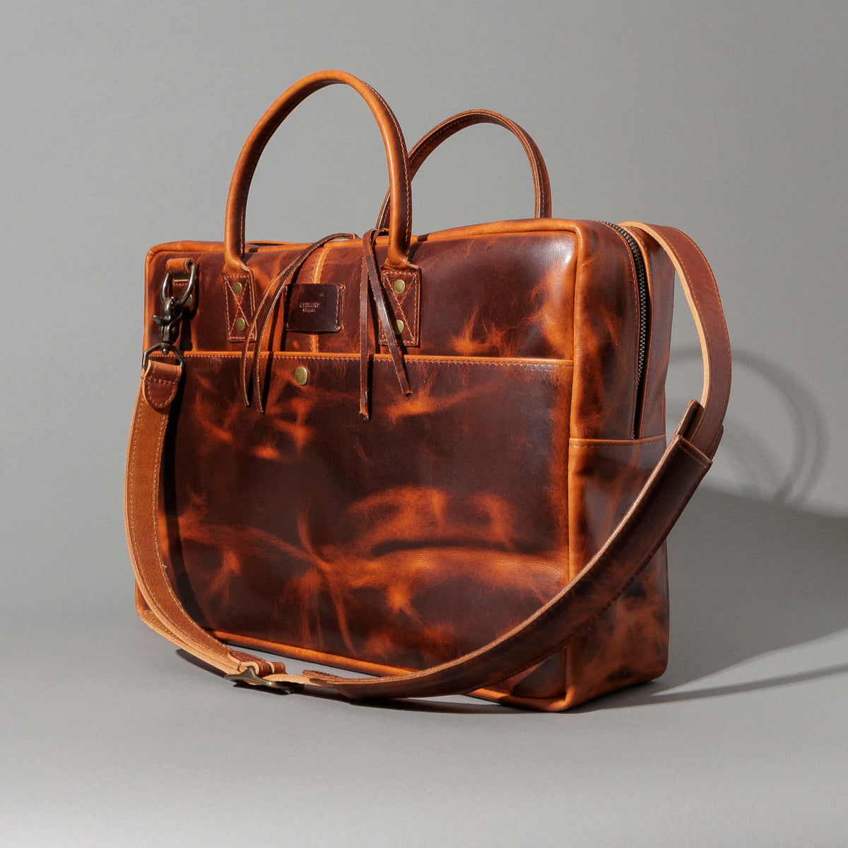 Ashland Leather LaSalle Briefcase, side-back three-quarter view with the shoulder strap
