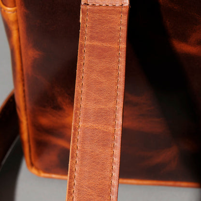Close-up of the side edge and handle strap on the Ashland Leather LaSalle Briefcase