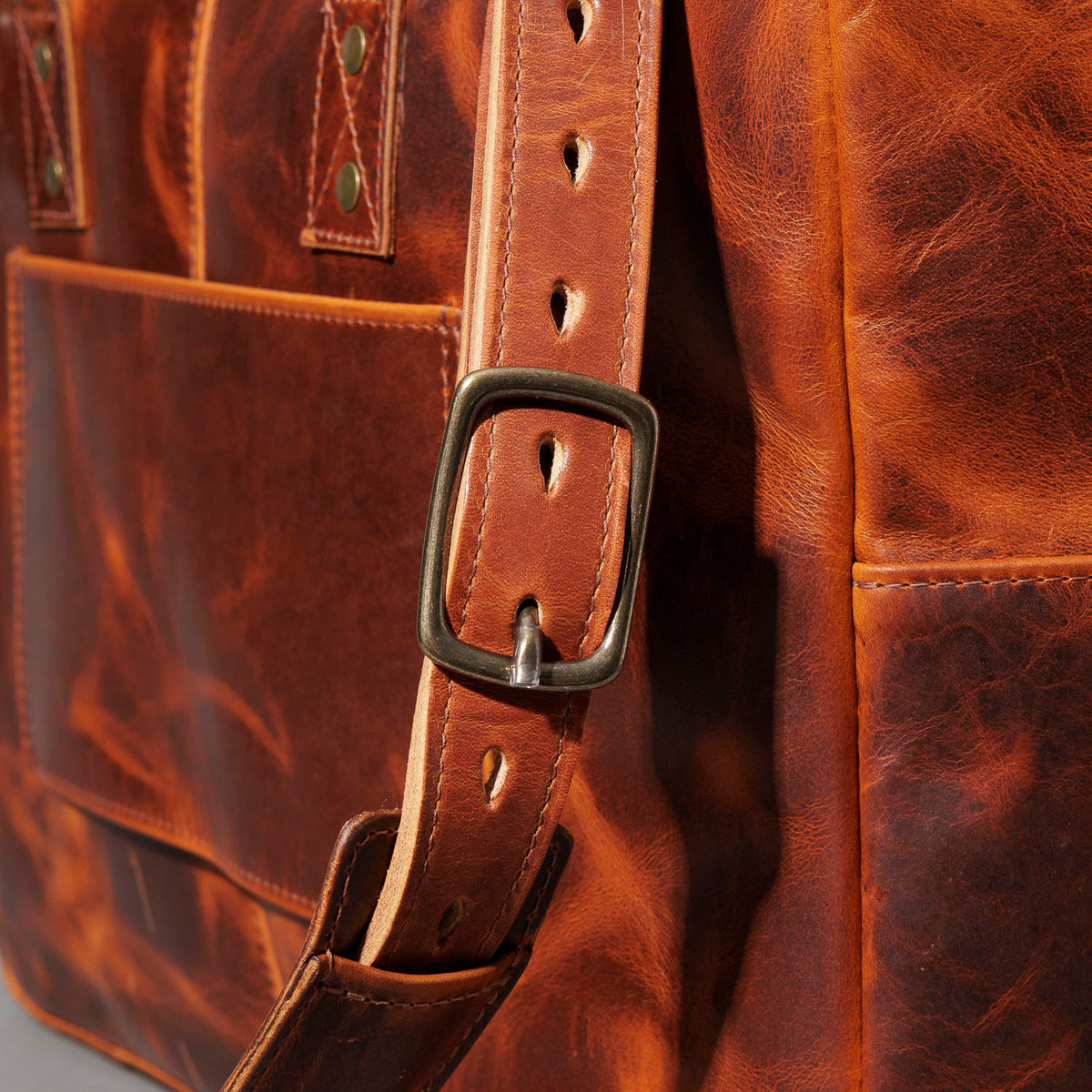Close-up of the adjustable shoulder strap buckle on the Ashland Leather LaSalle Briefcase