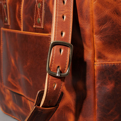 Close-up of the adjustable shoulder strap buckle on the Ashland Leather LaSalle Briefcase