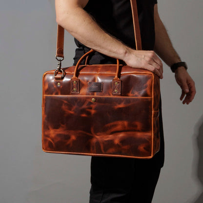Model wearing the Ashland Leather LaSalle Briefcase on its adjustable shoulder strap