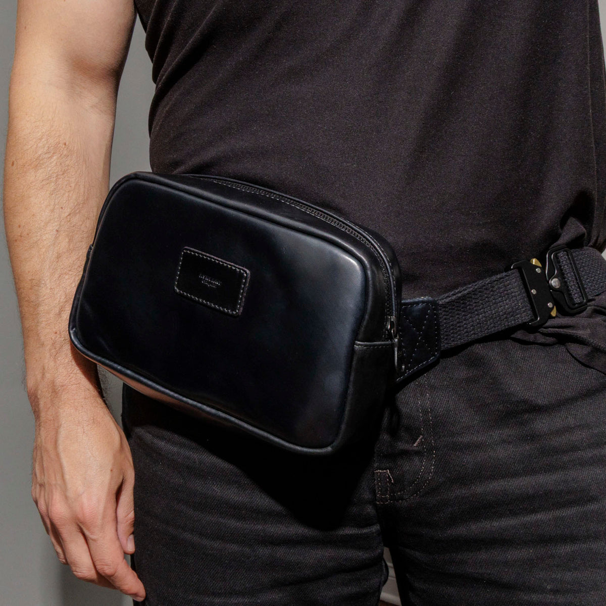 Close-up of the Ashland Leather Sling Bag worn crossbody, showing fit at chest height