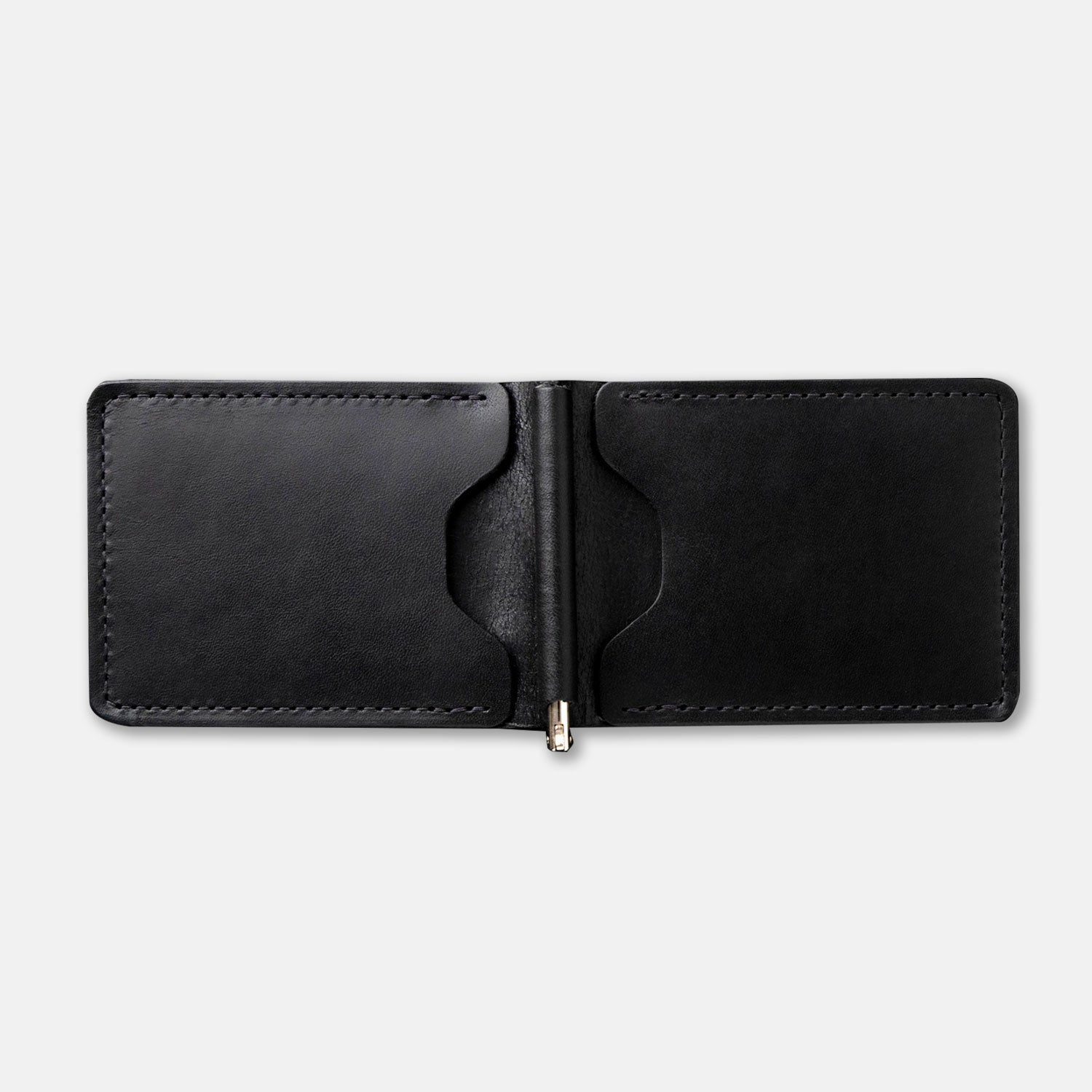 Capone Money Clip in black open flat on table with metal clasp visible