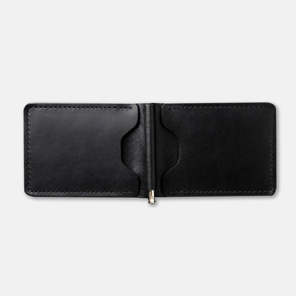 Capone Money Clip in black open flat on table with metal clasp visible