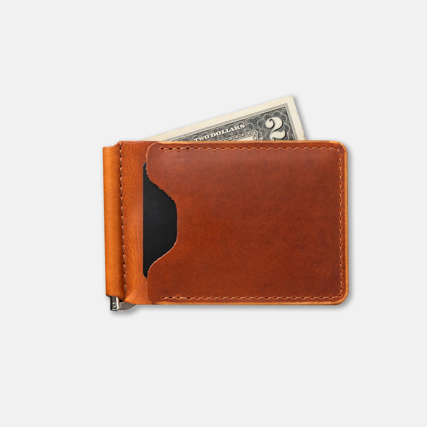 Brown leather money clip with a two-dollar bill sticking out on a white background