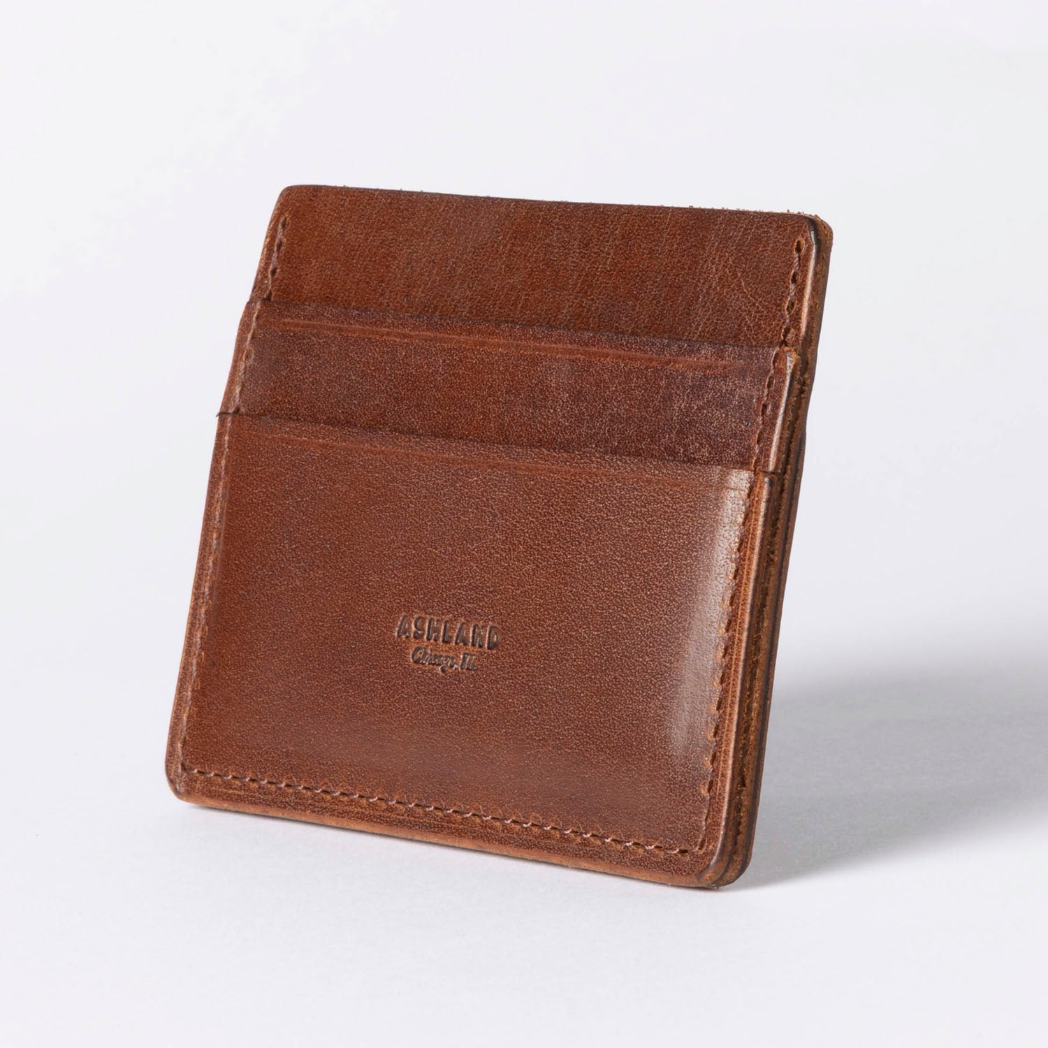 Brown leather wallet on a white background