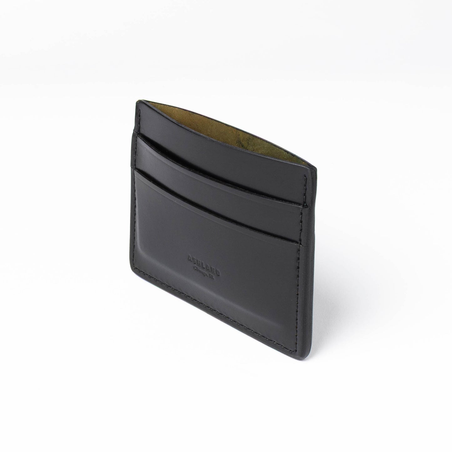 Black leather cardholder on a white background
