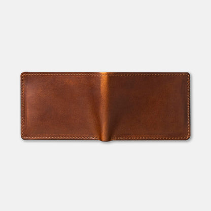 Johnny the Fox wallet laying flat open on white table, showing cover stitching details