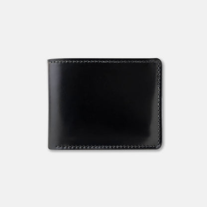 Black leather wallet on a light gray background
