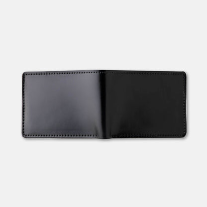 Johnny the Fox black shell cordvan cover laying flat on white background