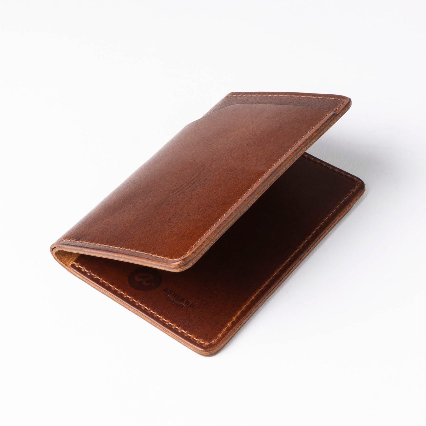 Brown leather wallet on a white background