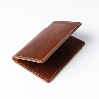 Brown leather wallet on a white background