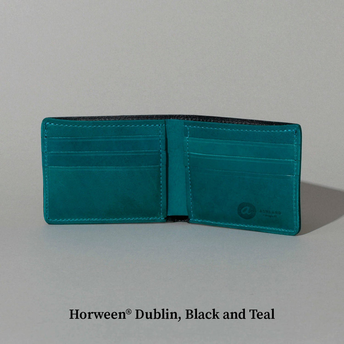Open Johnny the Fox bifold wallet in Horween® Dublin, black and teal