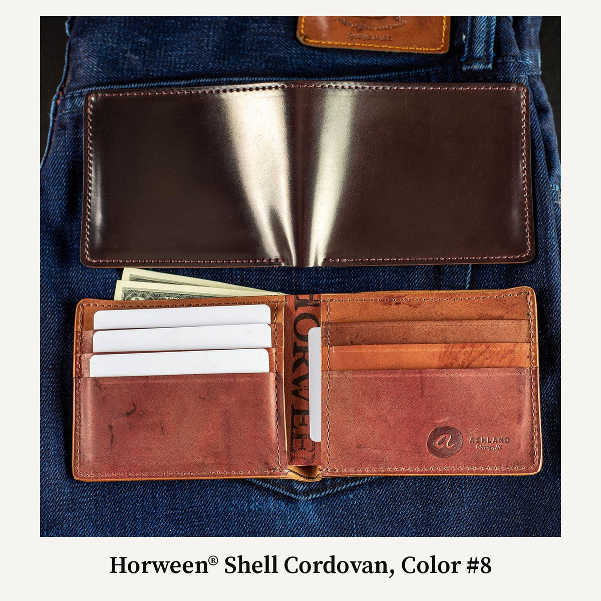 Open Johnny the Fox bifold wallet in Horween® Shell Cordovan, Color #8, with reverse interior on denim