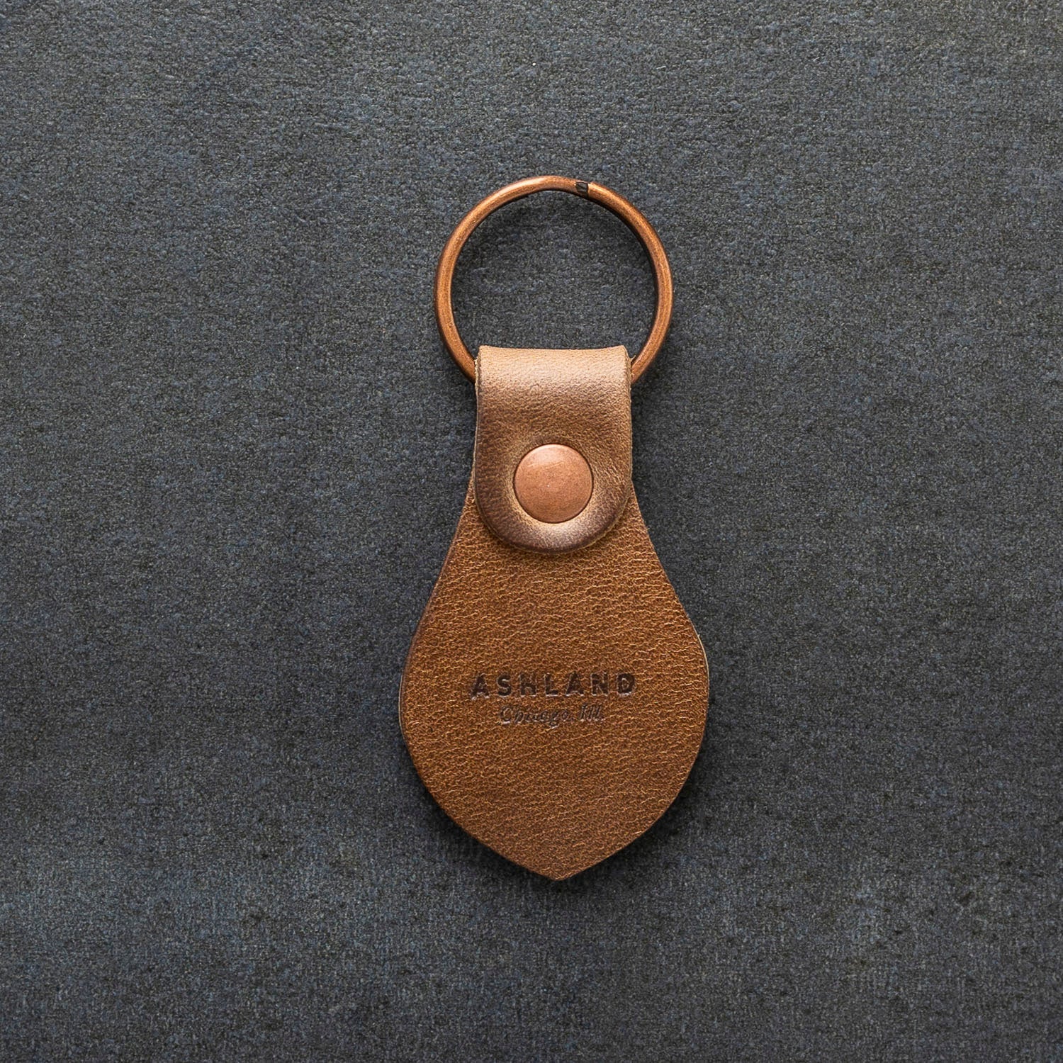 The Rivet Leather AirTag Keychain Case
