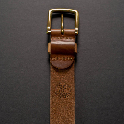 Vertical image of Ashland chromexcel belt, back of belt buckle with leather grain and size 38 stamp