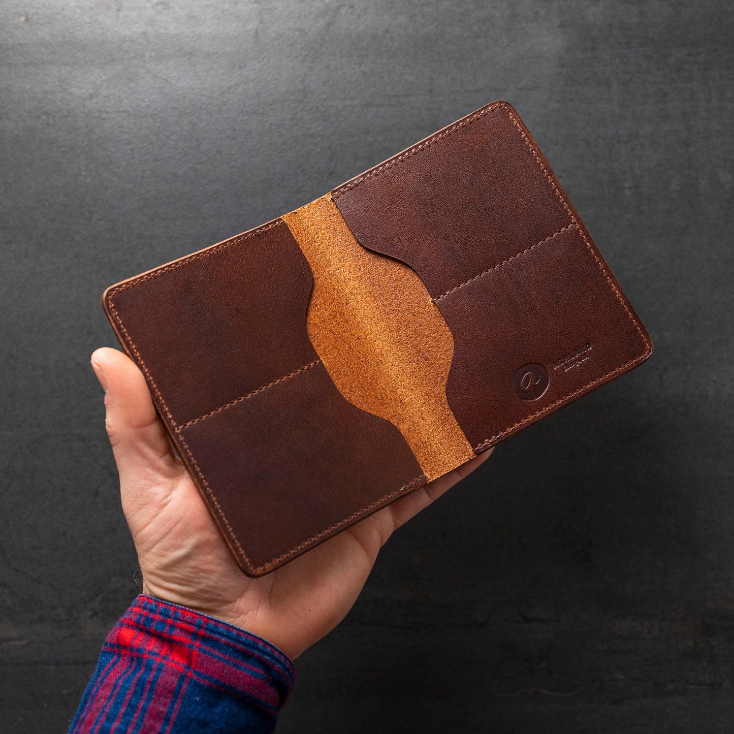 Hand showing open Fat Herbie Cypress men's large wallet