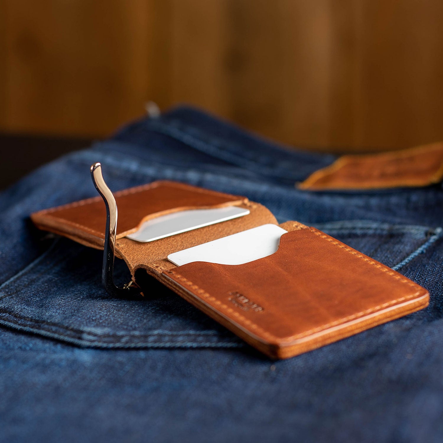 Capone Money Clip in English Tan Dublin, shown with money clip fastener open