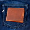 men's bifold wallet shown on selvedge denim